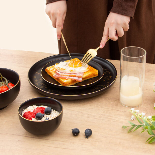 Elegant black and gold ceramic plate bowl set